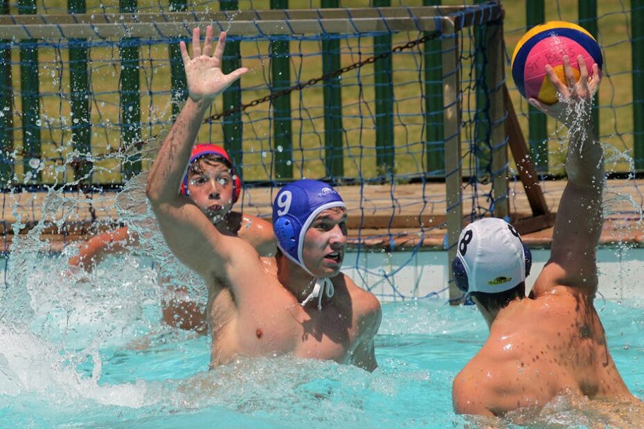 Three male athletes engaging in a dynamic water polo game highlighting sportsmanship and competition.